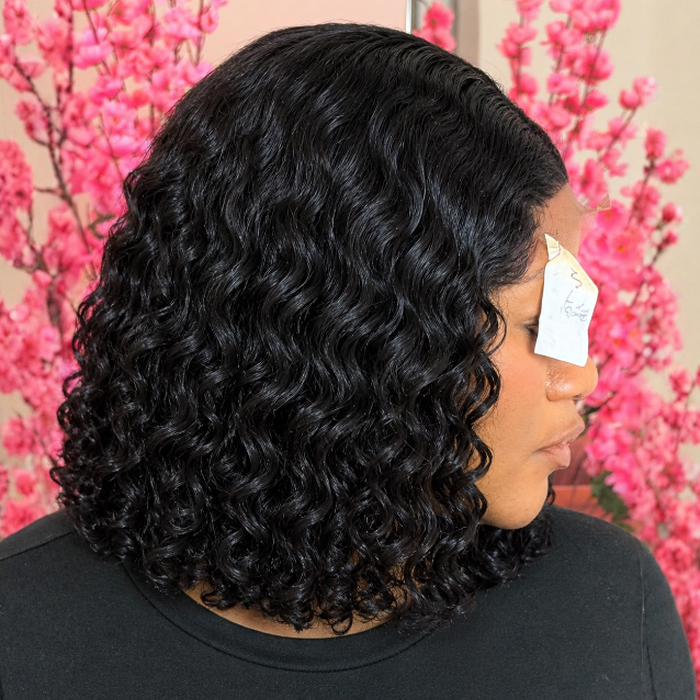Glossy Curly Bob Among Pink Blossoms (1)